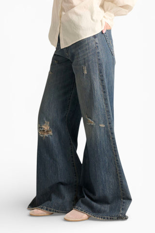 Jeans Brenda wide leg in denim fermo con abrasioni
