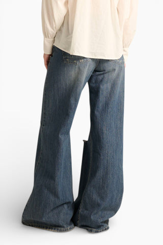 Jeans Brenda wide leg in denim fermo con abrasioni