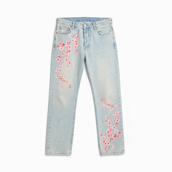 Jeans Celine boyfriend in denim used con stampa fiori di ciliegio