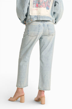 Jeans Celine boyfriend in denim used con stampa fiori di ciliegio