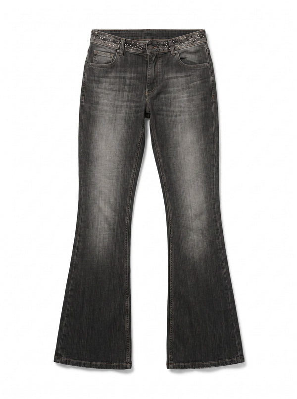 Jeans Claire flared bootcut in denim nero con borchie martellate sul bustino