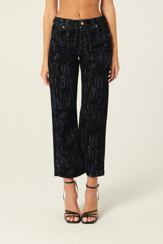 Pantaloni Denise a trombetta in denim floccato