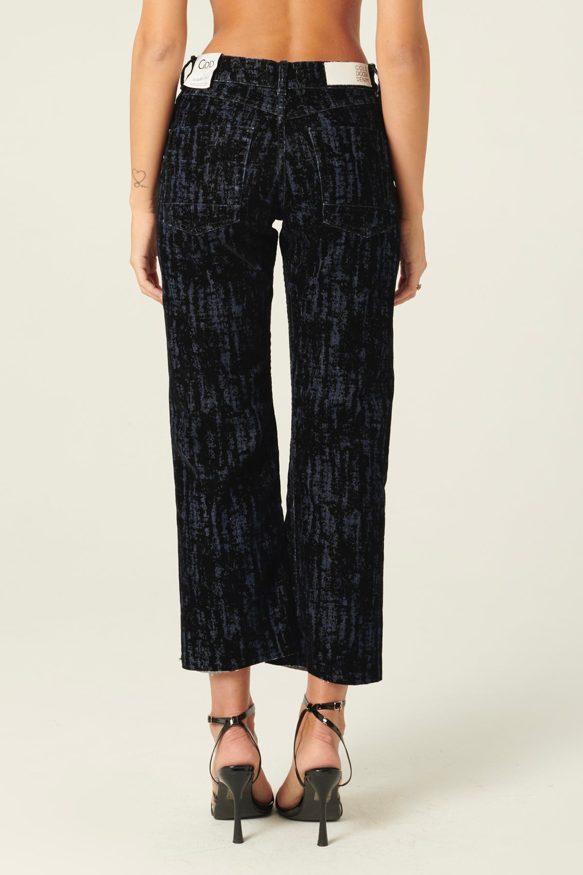 Pantaloni Denise a trombetta in denim floccato