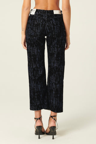 Pantaloni Denise a trombetta in denim floccato