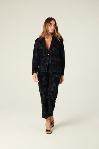 Pantaloni Denise a trombetta in denim floccato