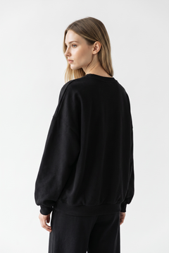 Felpa Pearl oversize con scollo a V e maniche curvate