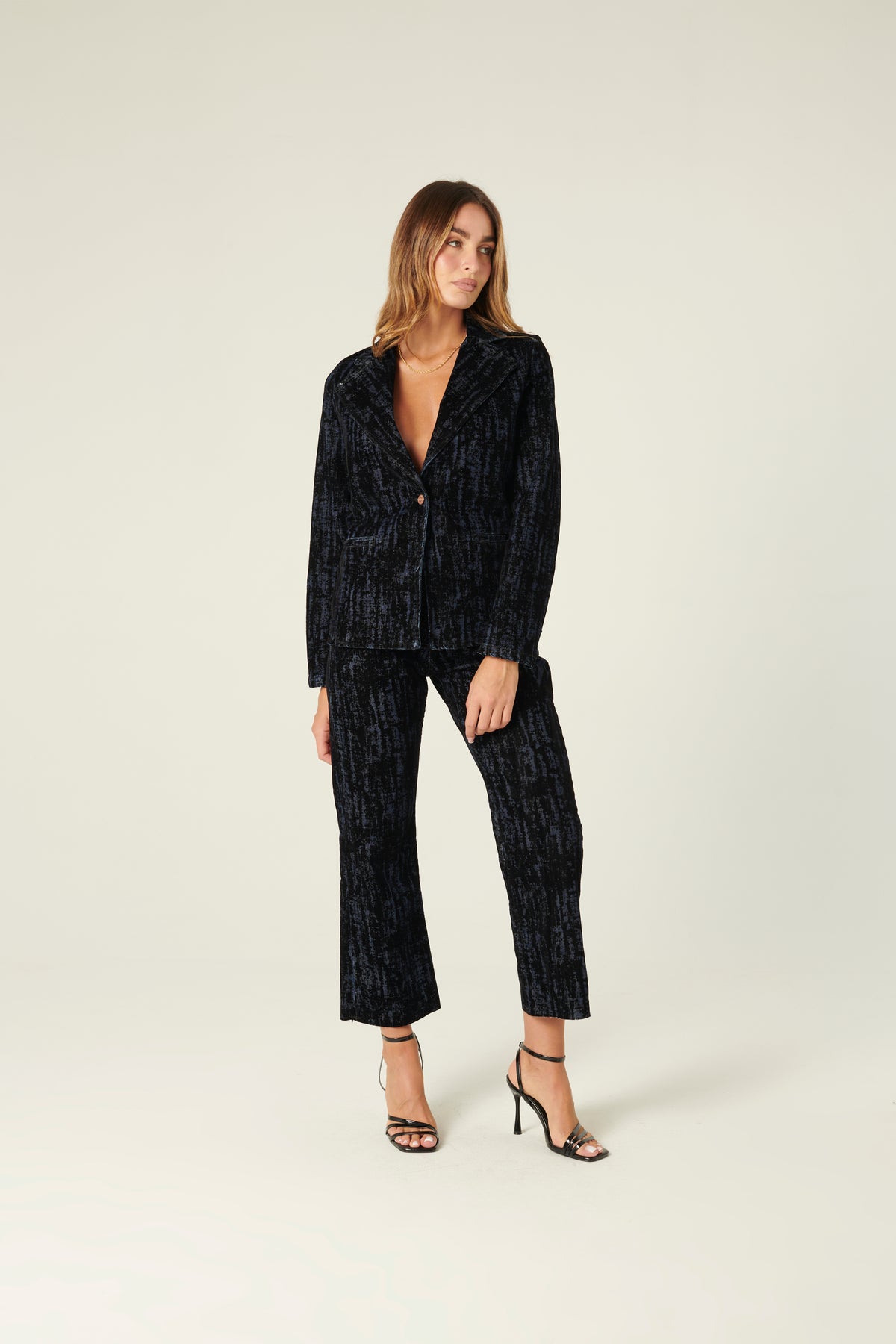 Pantaloni Denise a trombetta in denim floccato