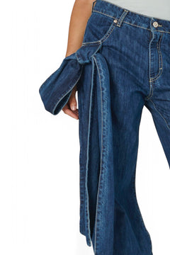 Jeans ALAIA con fiocco laterale