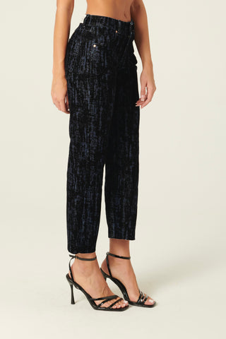 Pantaloni Denise a trombetta in denim floccato