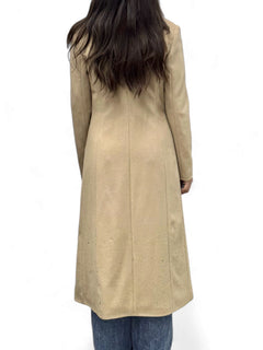 Long camel coat with front slits and foil splashes on the bottom