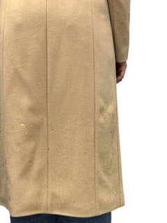 Long camel coat with front slits and foil splashes on the bottom