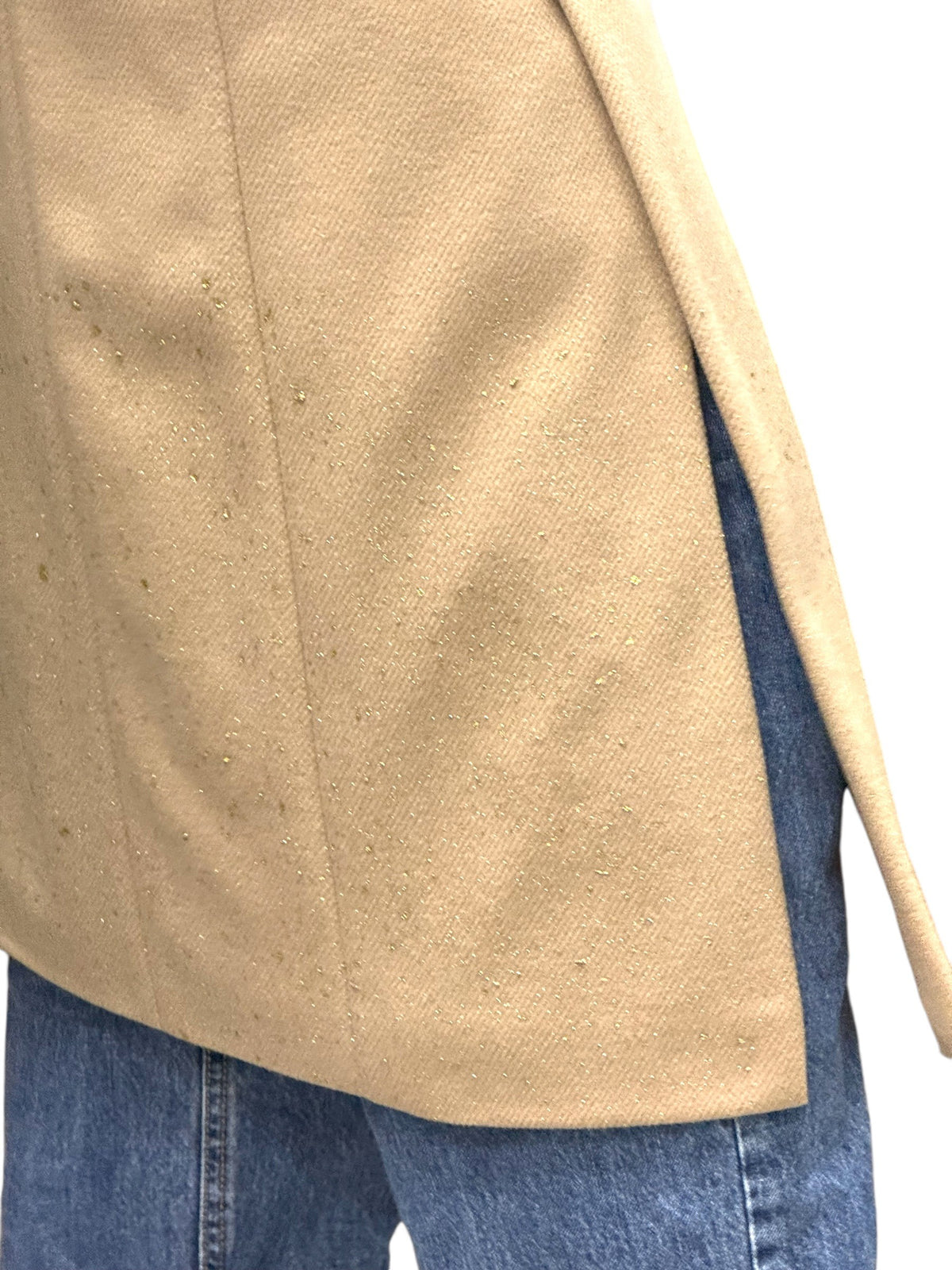 Long camel coat with front slits and foil splashes on the bottom